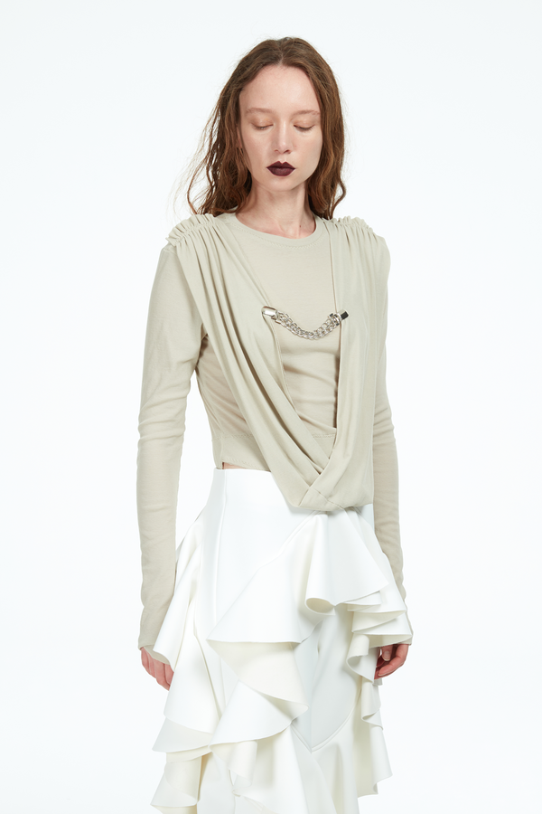 beige bodysuit with metal chain clasp