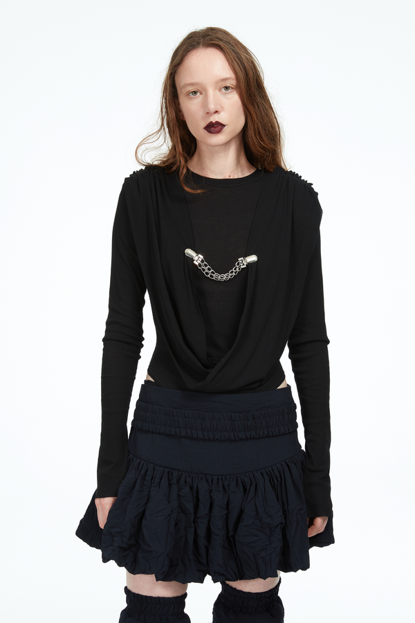 beige bodysuit with metal chain clasp