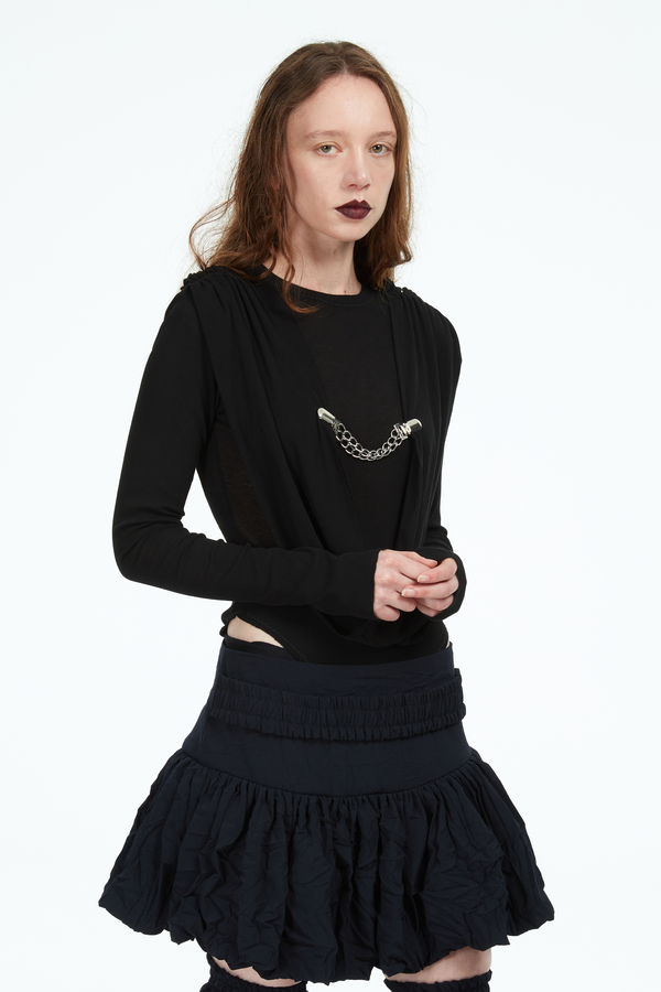 beige bodysuit with metal chain clasp