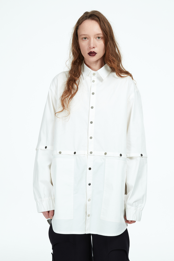 white shirt with silver snaps