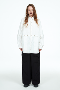 white shirt with silver snaps