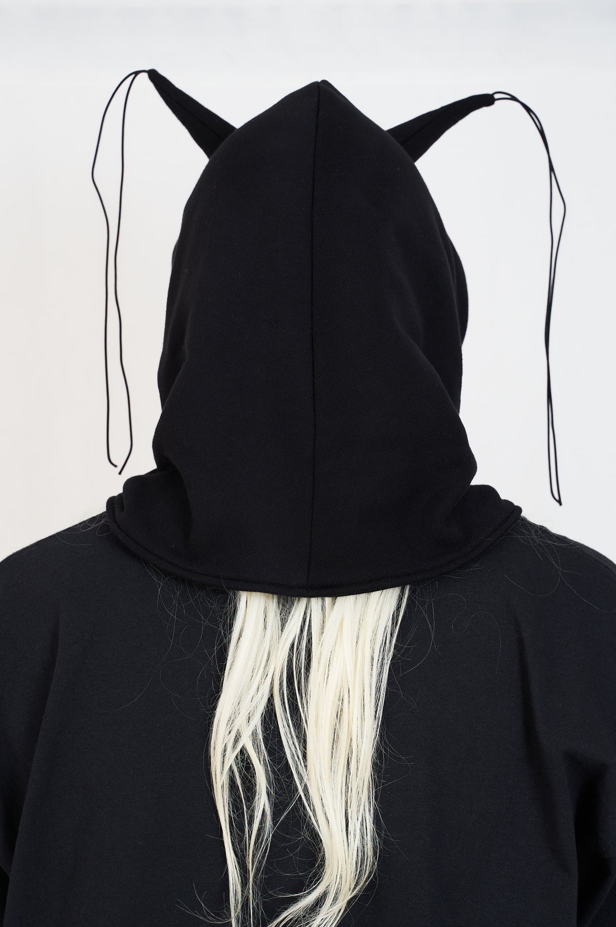 black hood with spikes