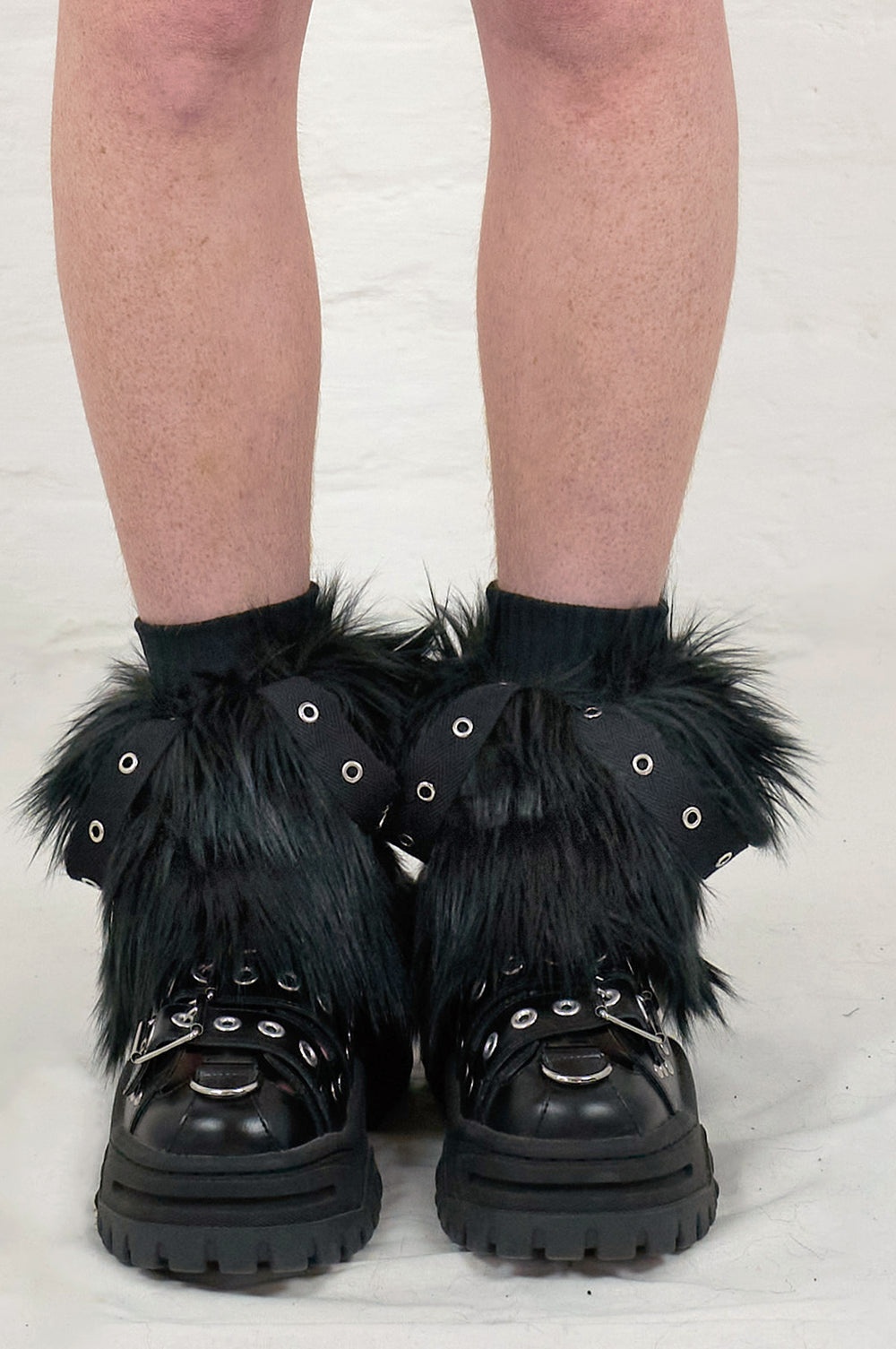 Black faux fur warmers with eyelets, goth emo aesthetic