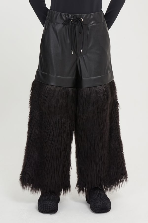 black vegan leather and faux fur trousers