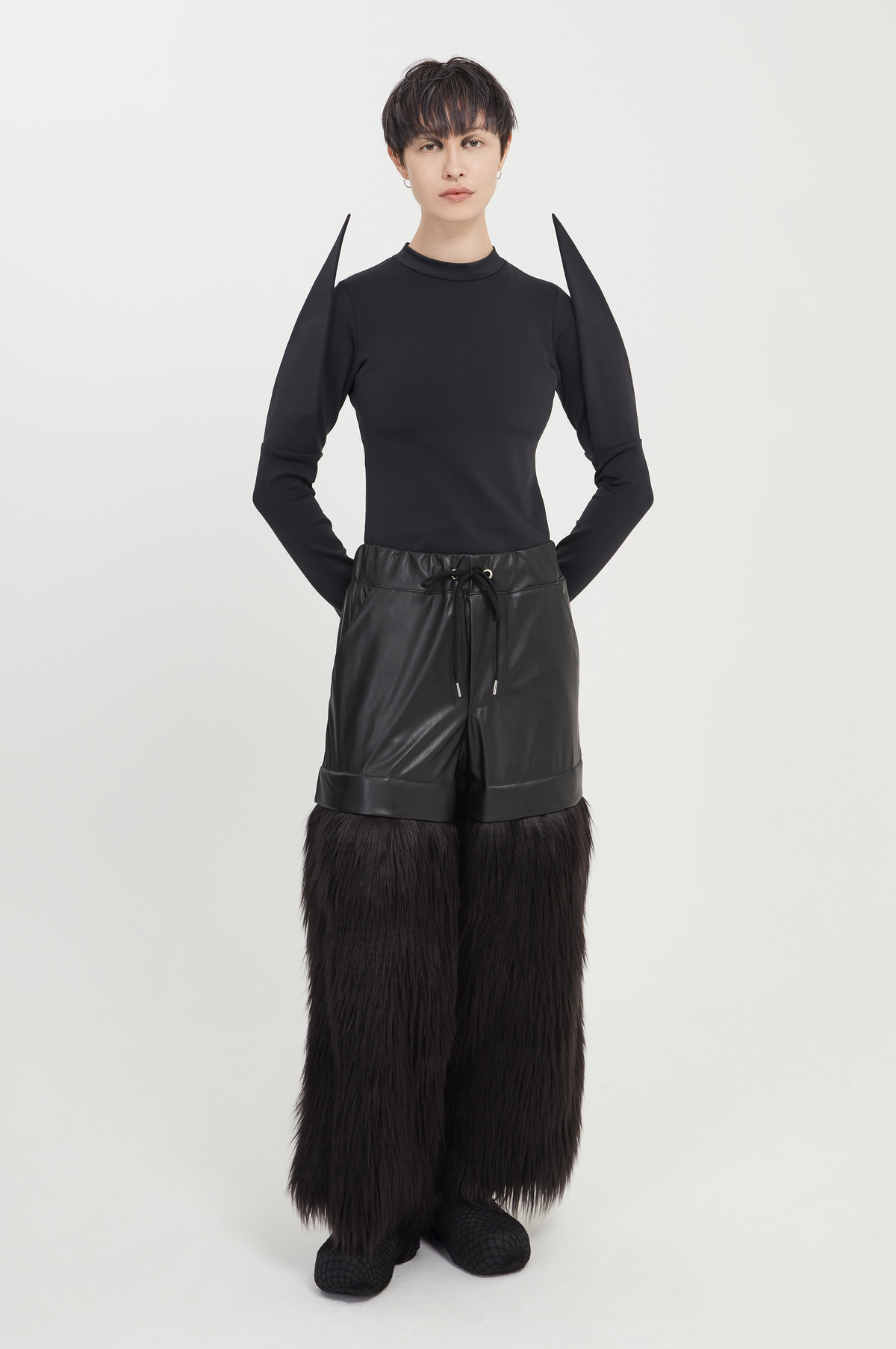 black vegan leather and faux fur trousers